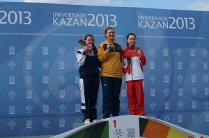 A golden shot: Australian women's trap shooter, Catherine Skinner, stands atop the podium with her gold medal.