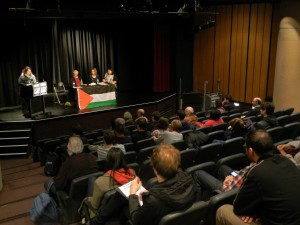 The three guest speakers prepare to address the audience on the pro-Palestine movement during the public forum at the Kaleide Theatre at RMIT University. (Photo by Sham Majid)