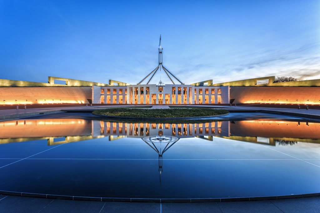 Dramatic Evening Sky Over Parliament House, Illuminated At Twilight ...