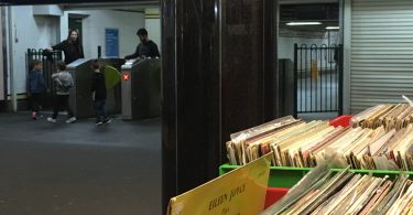 Record shop underneath Flinders Street station and barrier gates