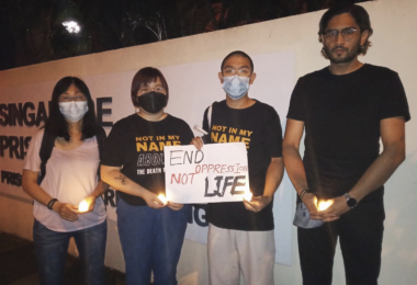 Kirsten Han and other advocates stand outside Changi Prison, Singapore, in April 2022 the night before an execution. Supplied: Kirsten Han.